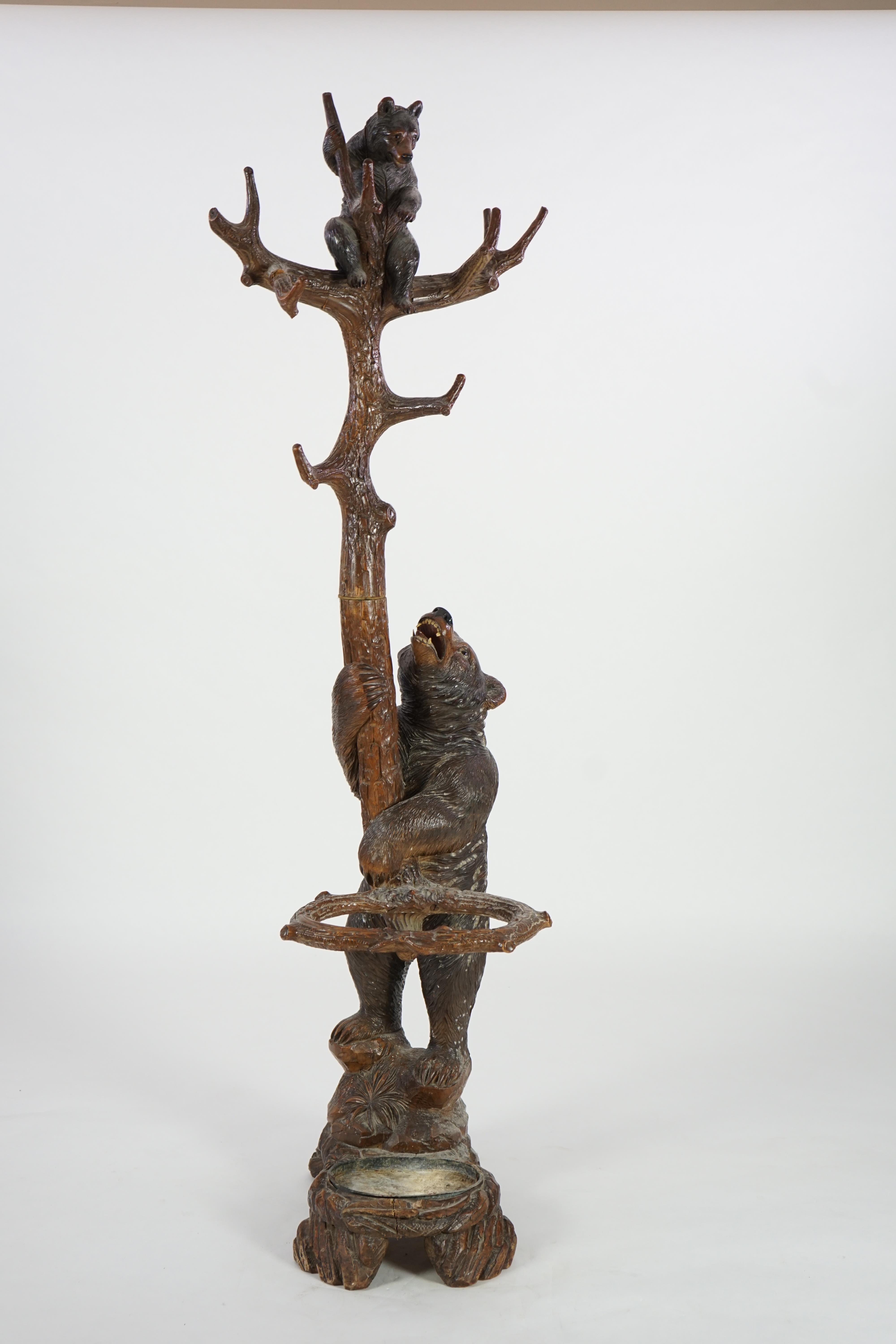 A 19th century Black Forest carved wood bear and cub hall stand